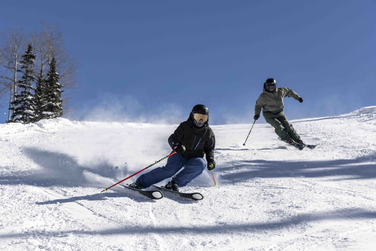 two people skiing