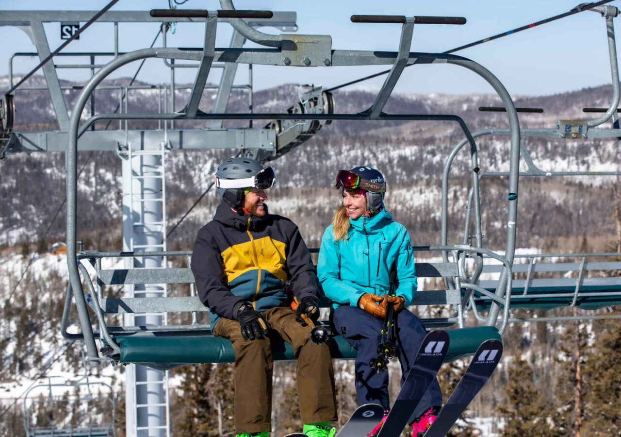 two people on a ski lift