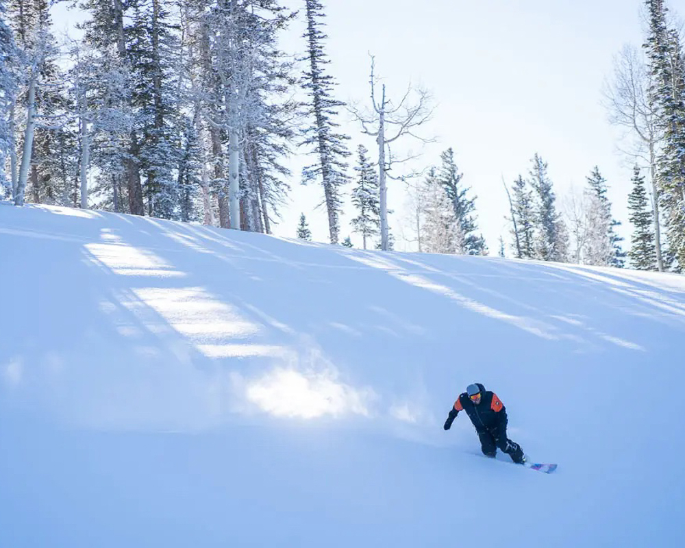 man snowboarding